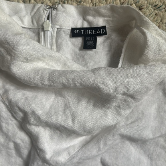 En Thread Sleeveless Ruffle Hem Top - Picture 2 of 3